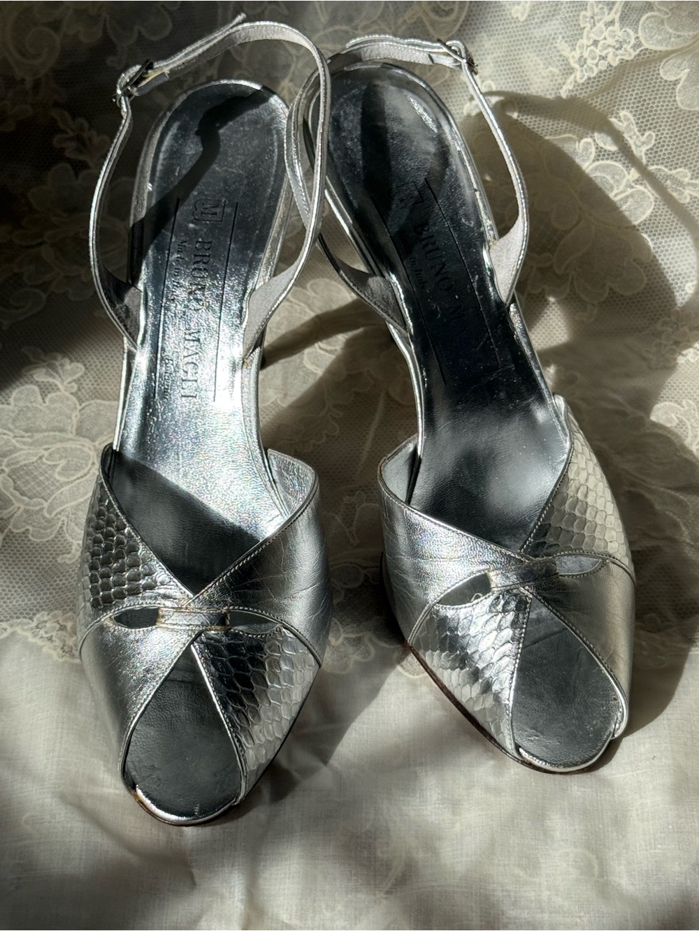 Bruno Magli Metallic Silver Cross‑Front Slingback Sandals